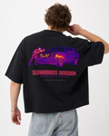 Person wearing a black t-shirt with a graphic design and text on the back, on a white background